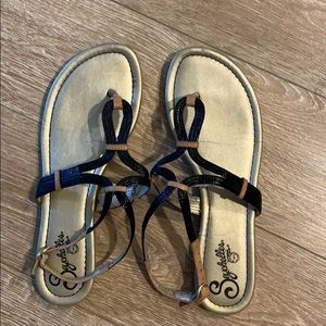 Black and gold flip flops! Super comfy!